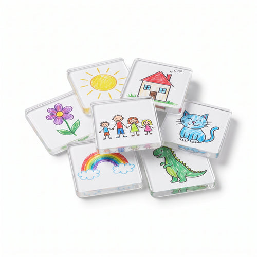 Clear acrylic magnetic frames displaying children's drawings