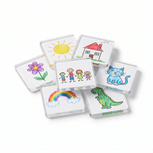 Clear acrylic magnetic frames displaying children's drawings